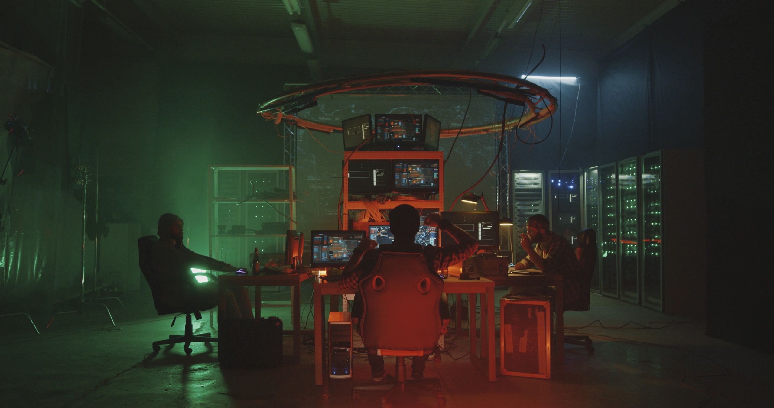 indie game developers cyberpunk neon workspace